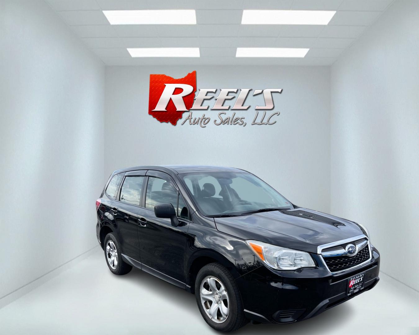 2015 Black /Black Subaru Forester 2.5i (JF2SJAAC1FH) with an 2.5L H4 SOHC 16V engine, Automatic transmission, located at 11115 Chardon Rd. , Chardon, OH, 44024, (440) 214-9705, 41.580246, -81.241943 - Photo#2